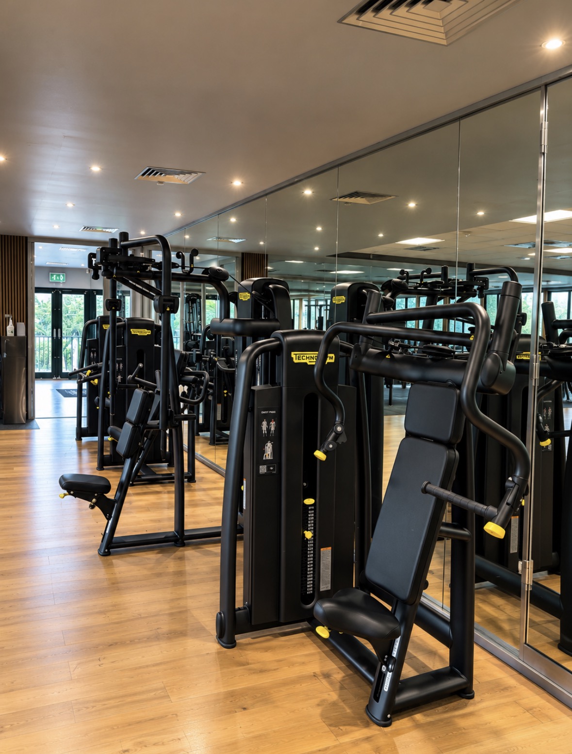 cardio machines overlooking the golf course at Three Rivers gym